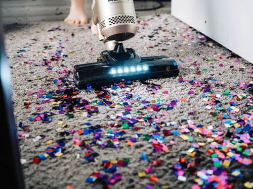 vacuuming the floor